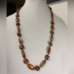 Weird and unusual brown bead necklace